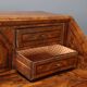 Antique walnut burr drop-leaf cabinet with 8 drawers, Italy, 18th century.