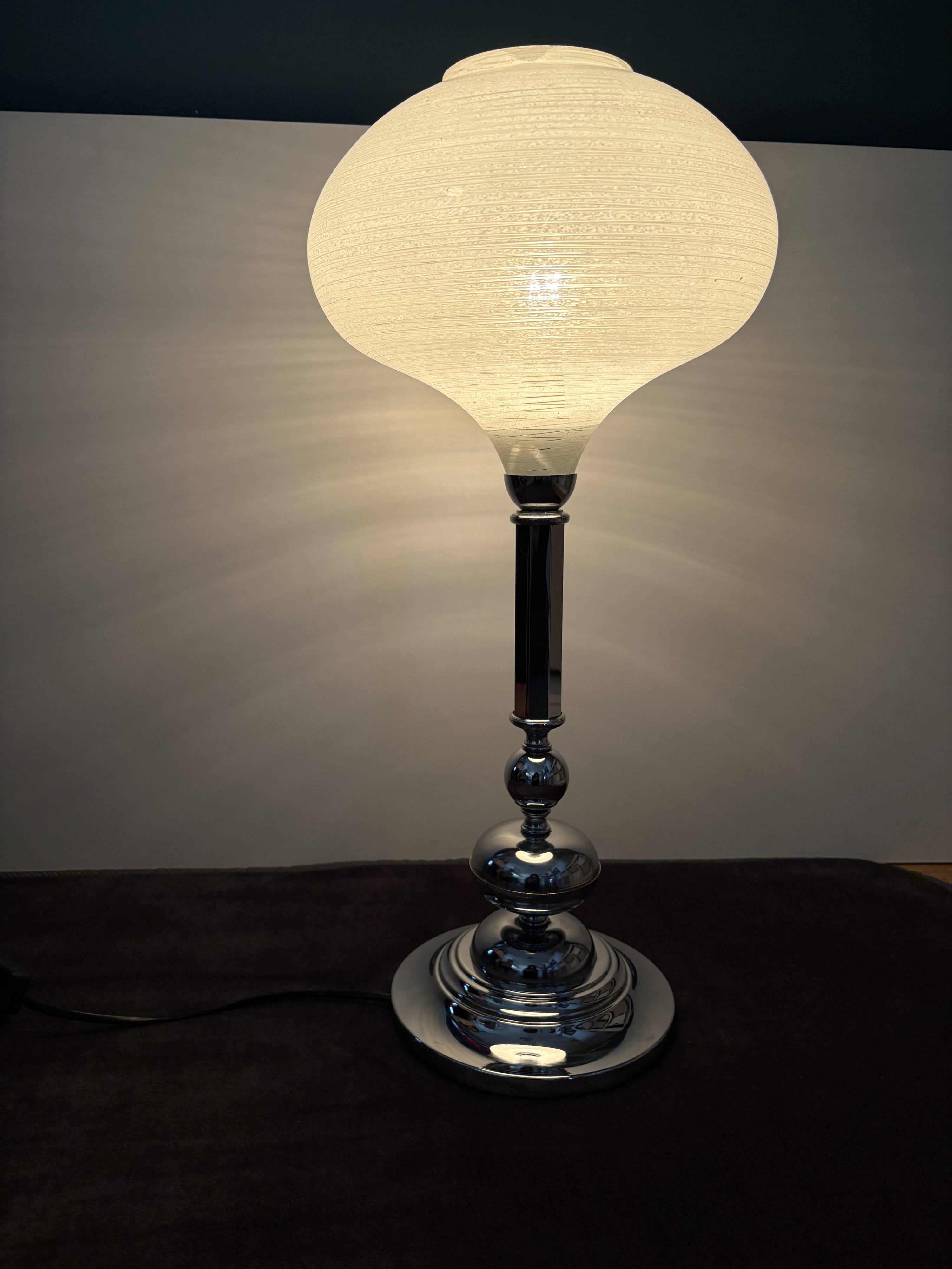 Large Art Deco table lamp, chrome base and satin glass globe.