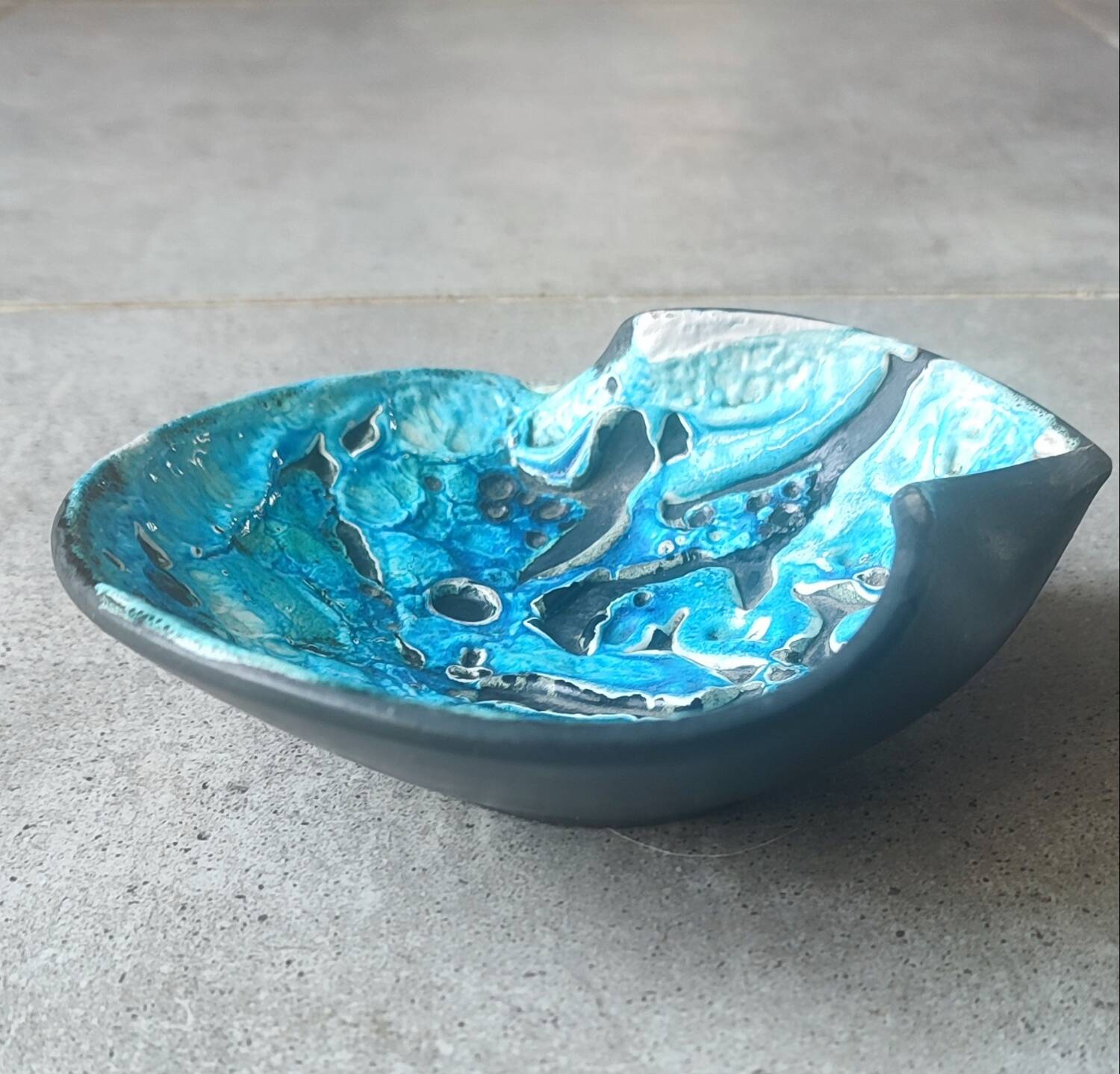 Cyclops ceramic pocket emptier by Emaux des Glaciers