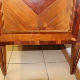 Dresser to music attributes of Louis XVl era