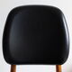 Suite of 6 Chairs Baumann model Pegasus in beech and faux black leather