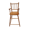 Old little high chair of light wood dolls