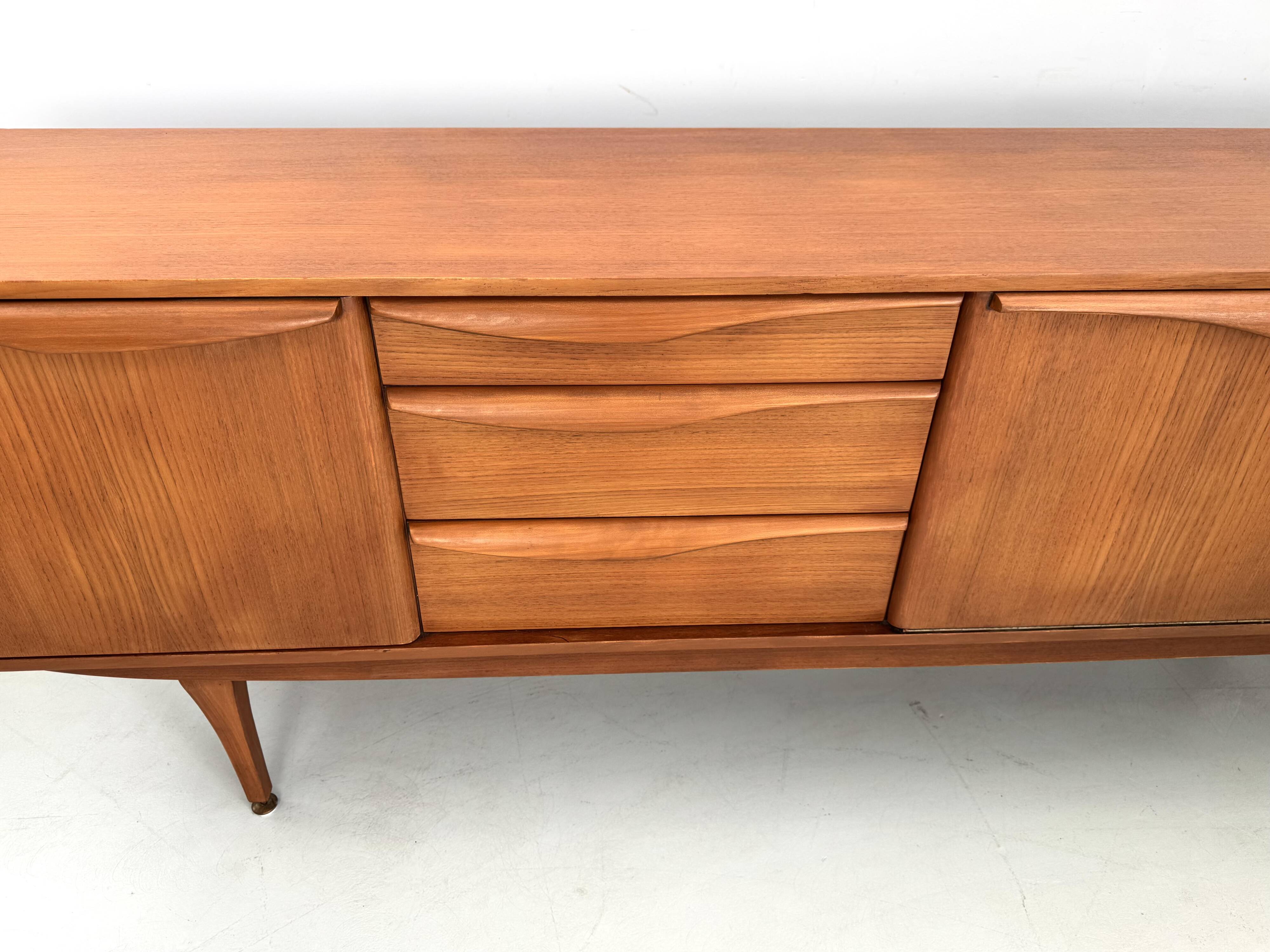 Beautiful and unique Stonehill sideboard from the 1960s made of teak wood.