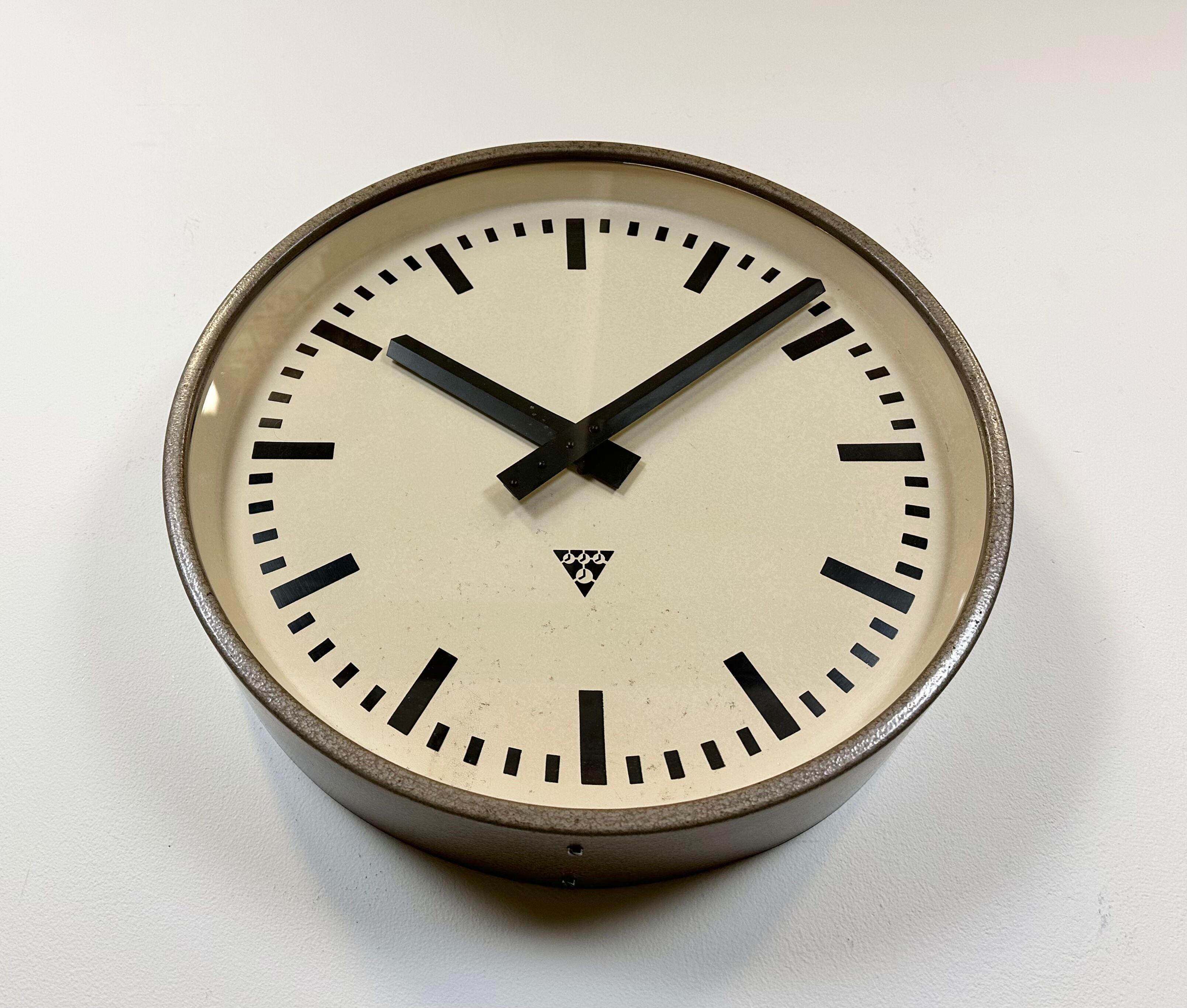 Brown industrial factory wall clock from Pragotron, 1960s
