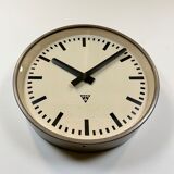 Brown industrial factory wall clock from Pragotron, 1960s