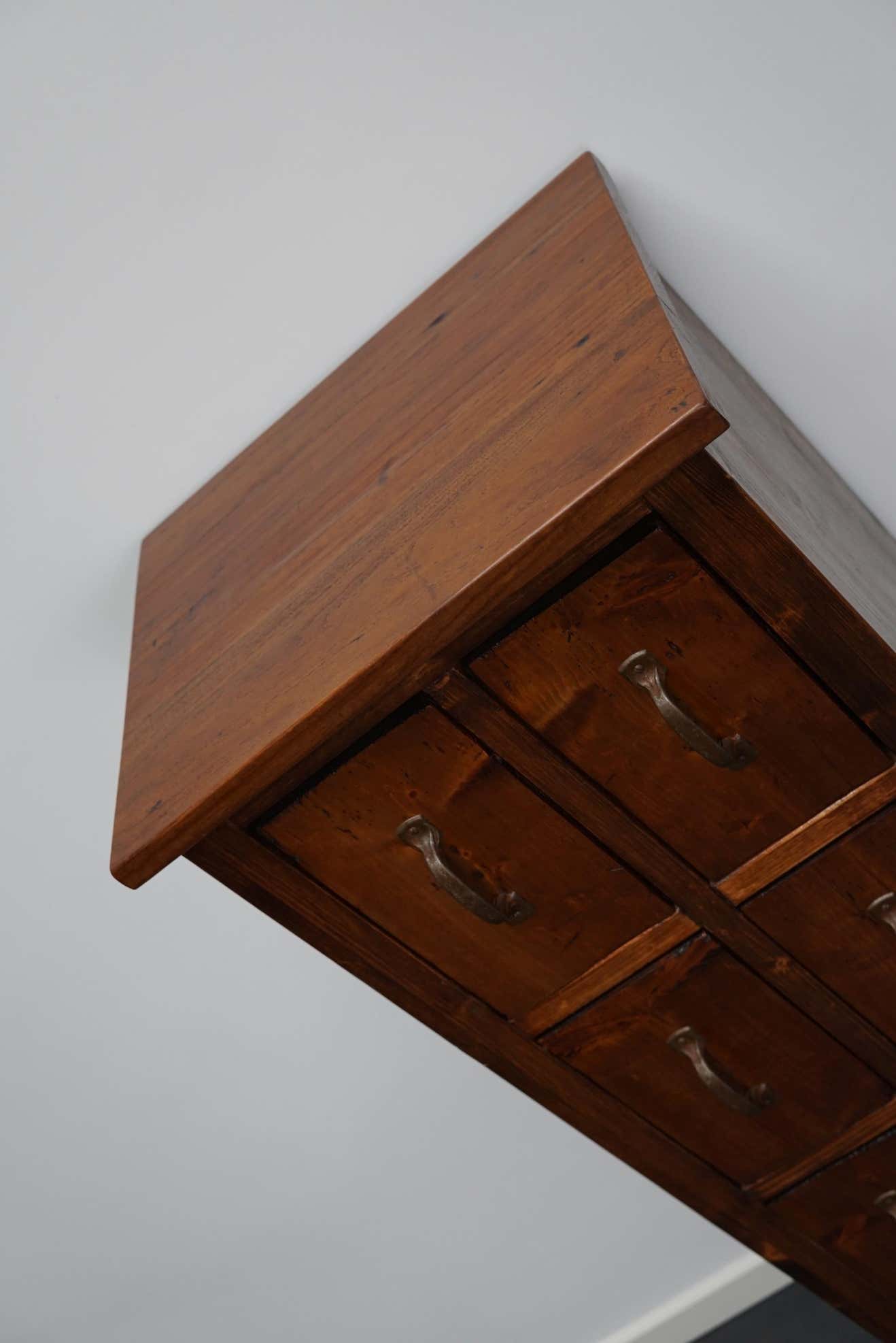 Apothecary or industrial workshop cabinet in pine Netherlands 1930