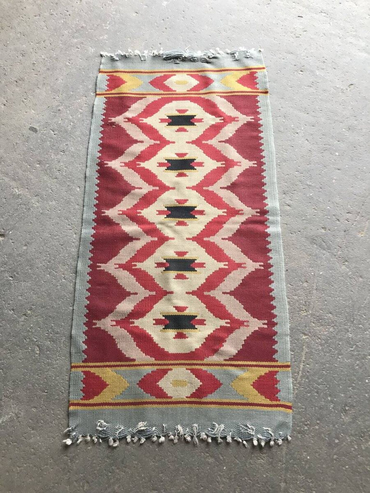 Burgundy runner rug in flat woven kilim fabric, Mid-Century style 1940s Czech Republic.