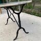 Table de bistrot marbre ovale et acier noir 4 couverts 120cm