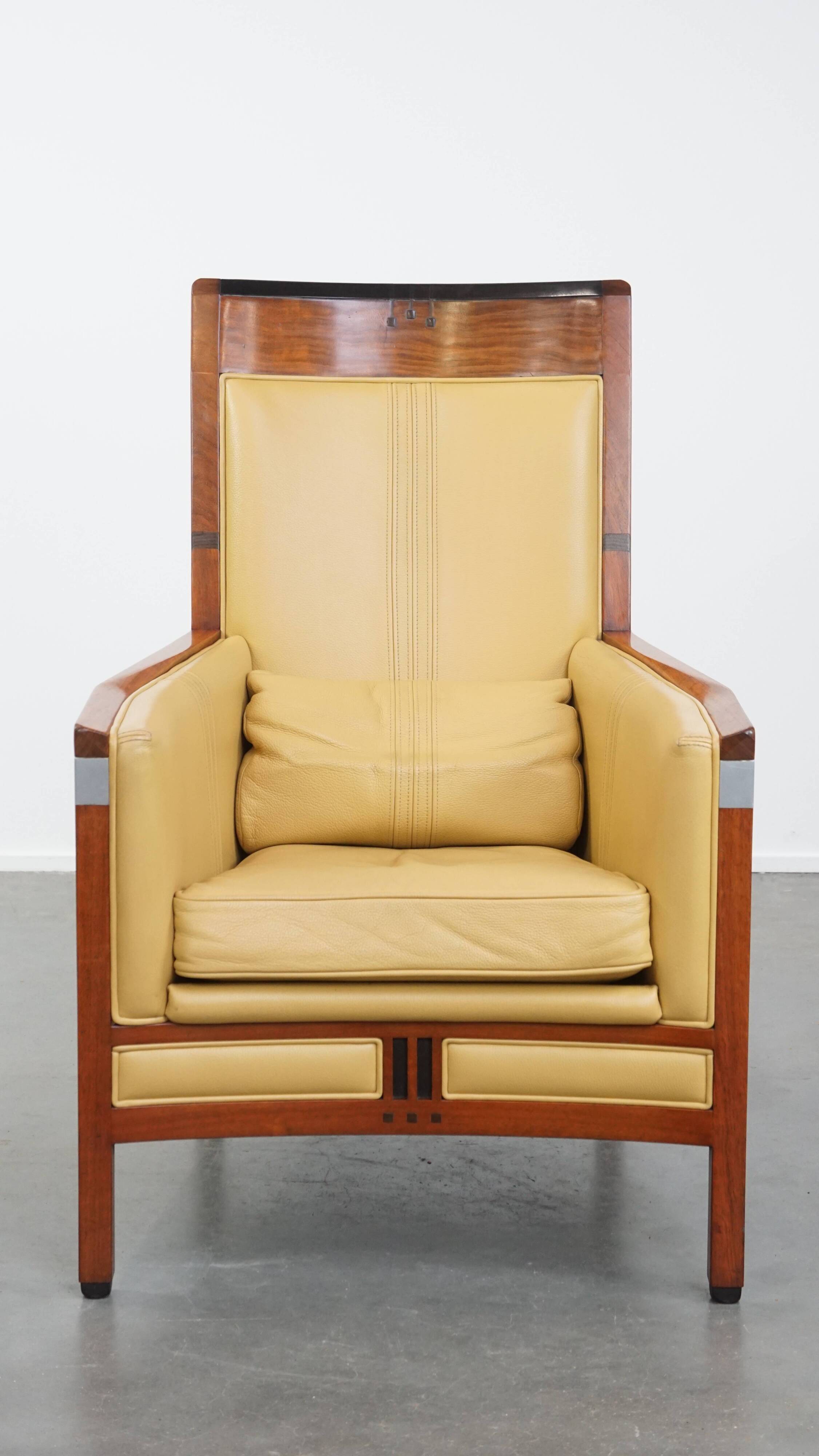 Art Deco armchair in yellow leather with high back