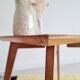 Table basse pieds compas dessus marqueté