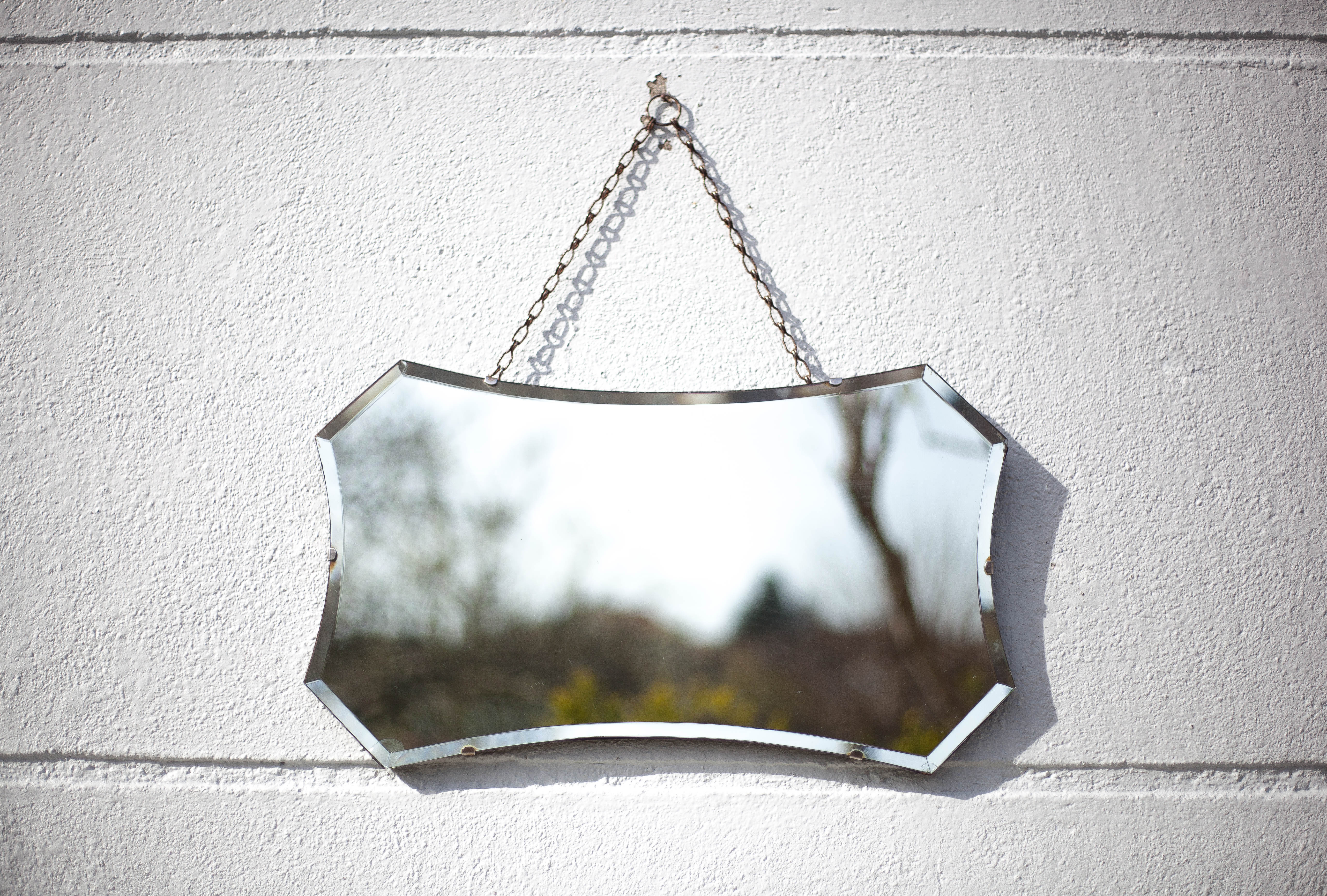 Vintage wall mirror with beveled chain