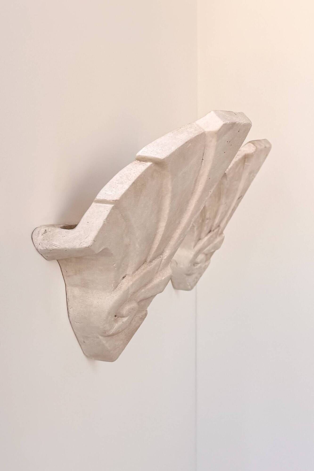 Pair of vintage geometric wall sconces in plaster, France, 1960.