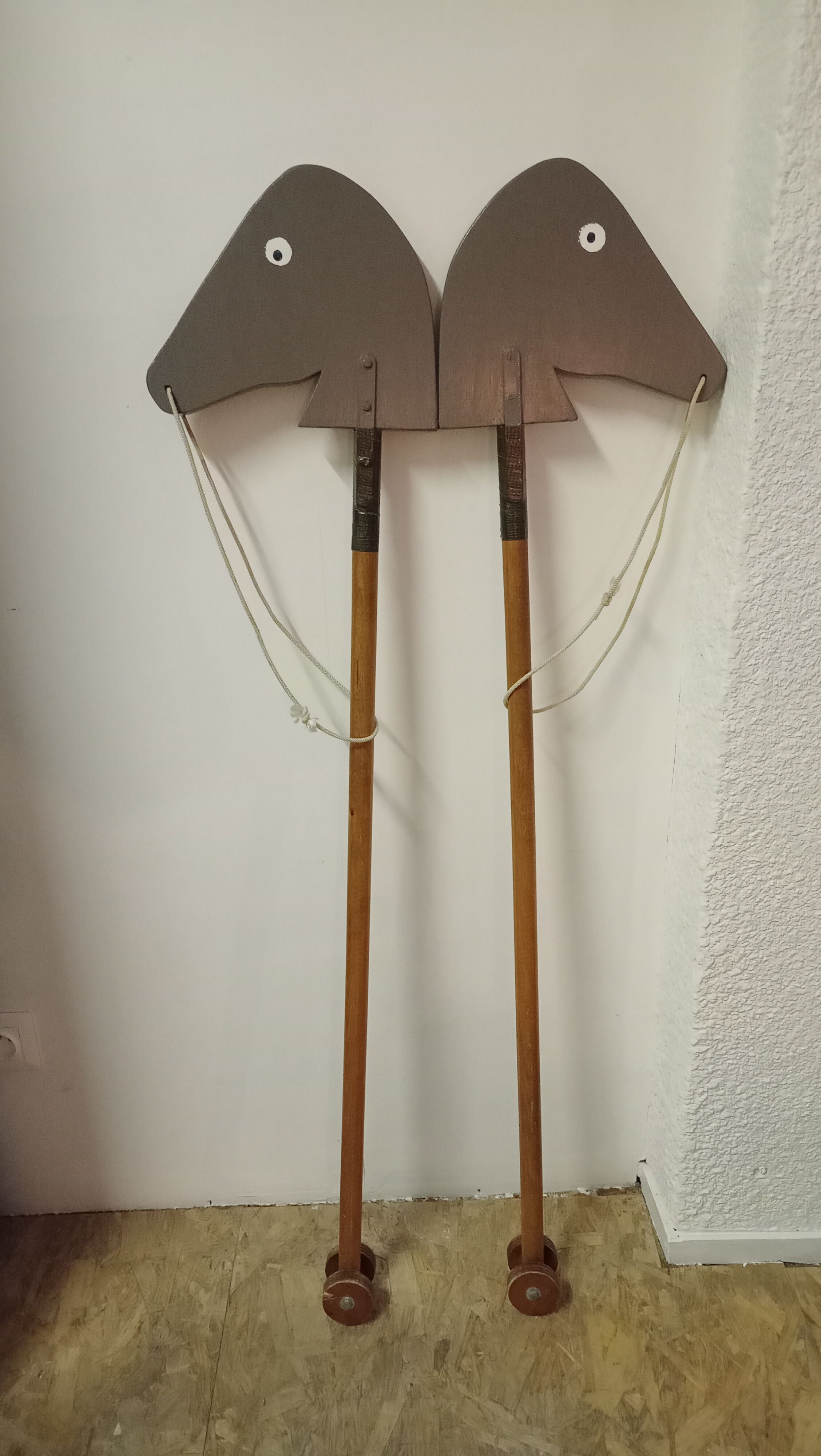 Wooden horses stick on wheels