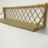 Wall shelf in rattan 50s