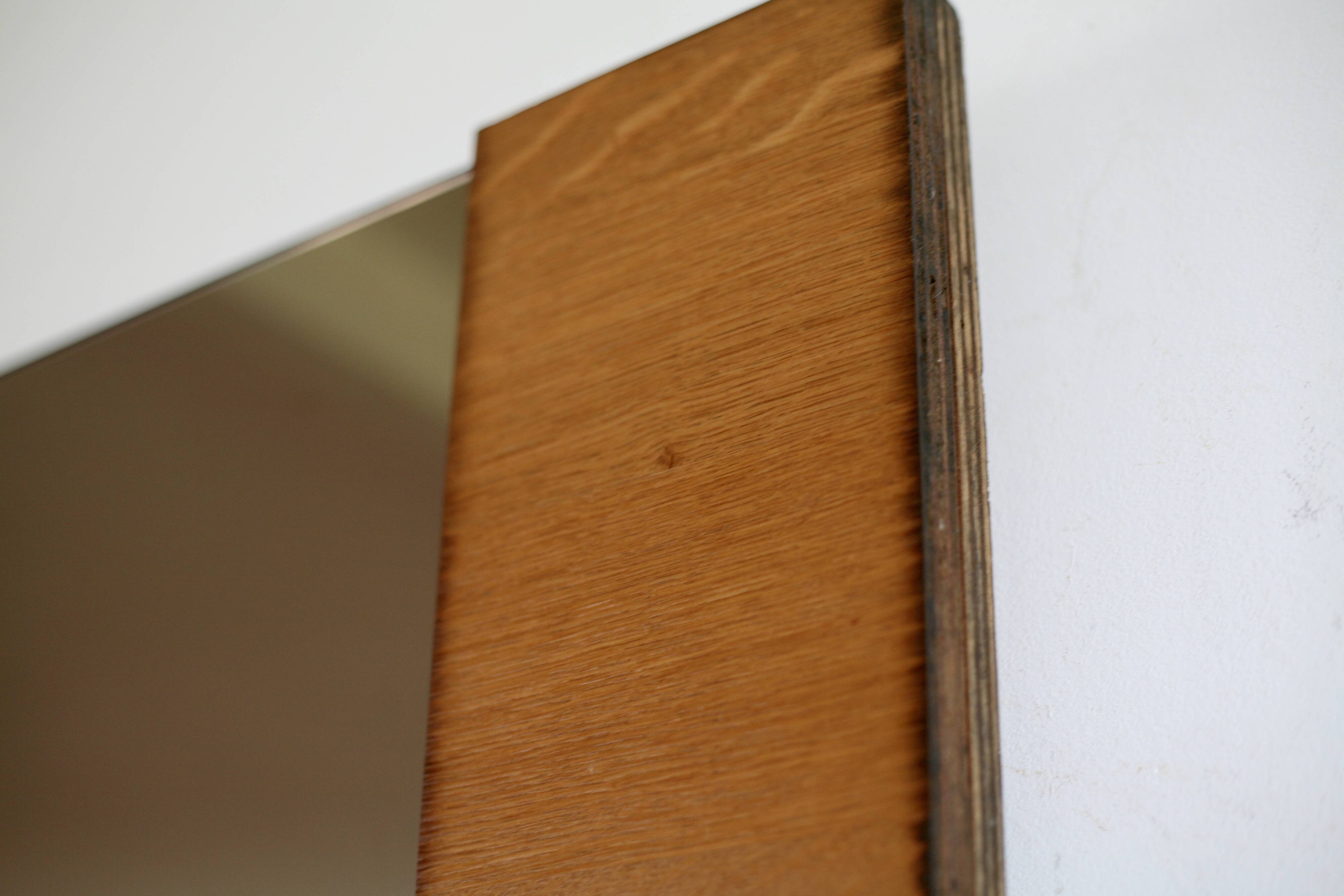 Grand miroir fumé encadrement asymétrique, années 70