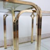 Series of nesting tables in smoked glass & rectangular golden brass