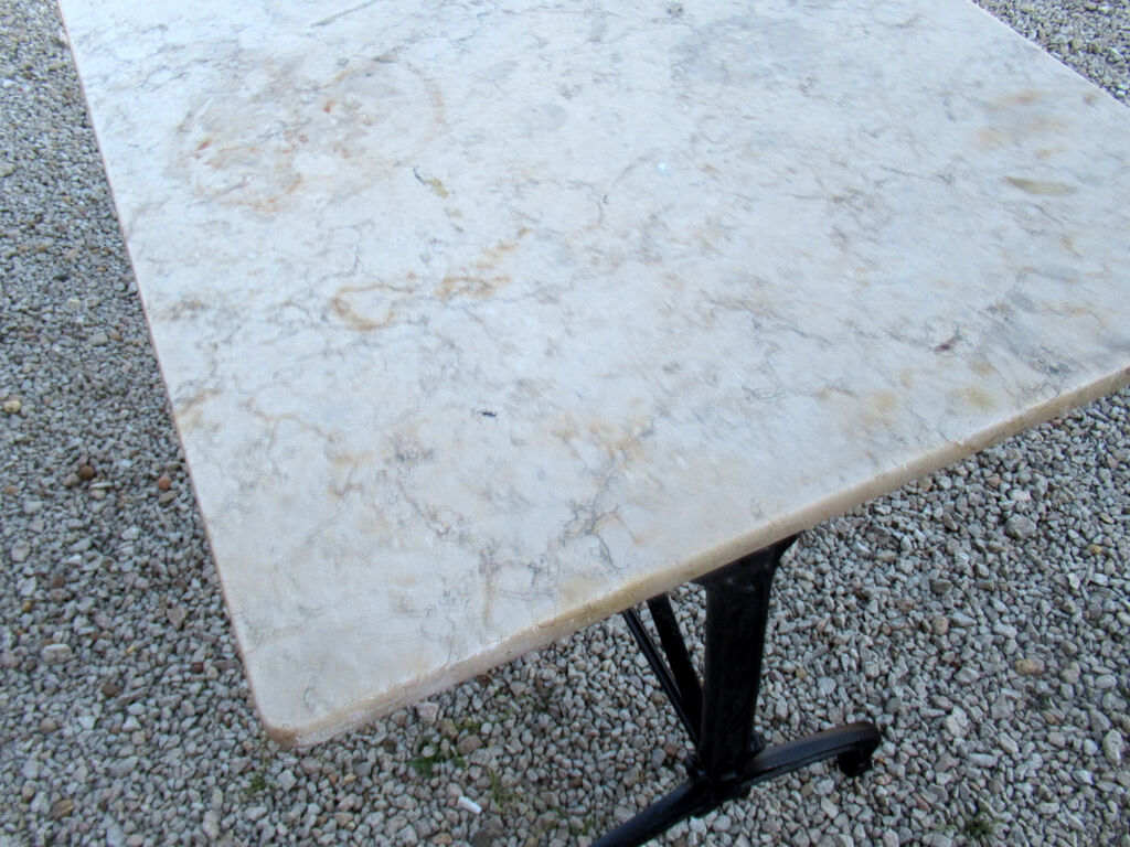 Bistro table, 1900, cast iron foot and marble top.