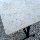 Bistro table, 1900, cast iron foot and marble top.