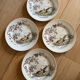 Polychrome ironstone dessert plates from Digoin and Sarreguemines.