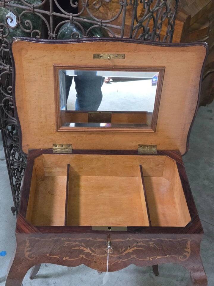 work table from the Napoleonic III era with marquetry of scrolls and patterns