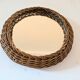 Round mirror in 60s design woven rattan