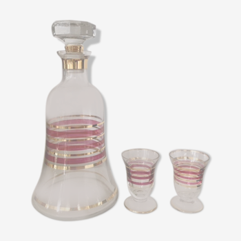 Glass carafe and two glasses