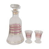 Glass carafe and two glasses