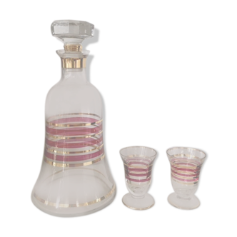 Glass carafe and two glasses
