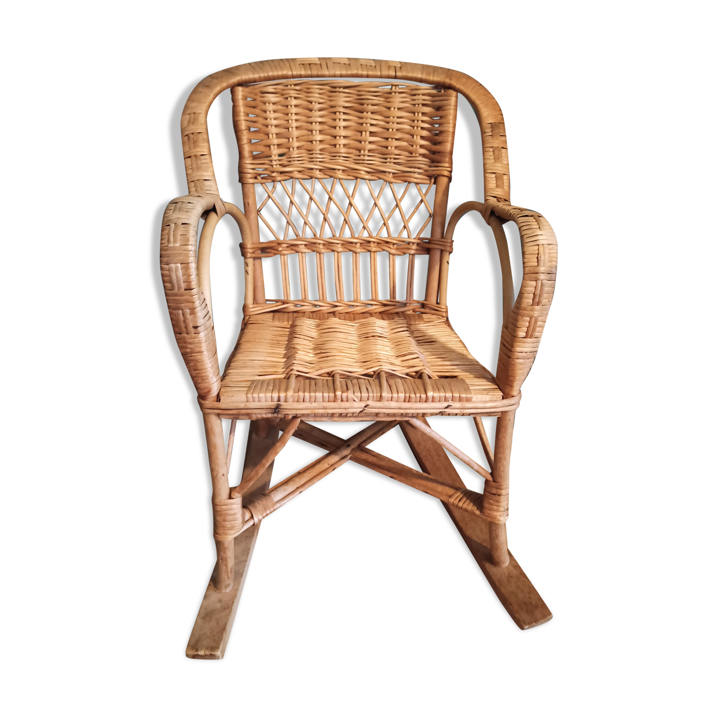 Vintage rattan children's rocking chair