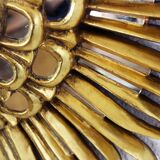 Sun mirror in wood and gilded stucco