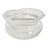 Blown glass ashtray with bubbles, transparent.