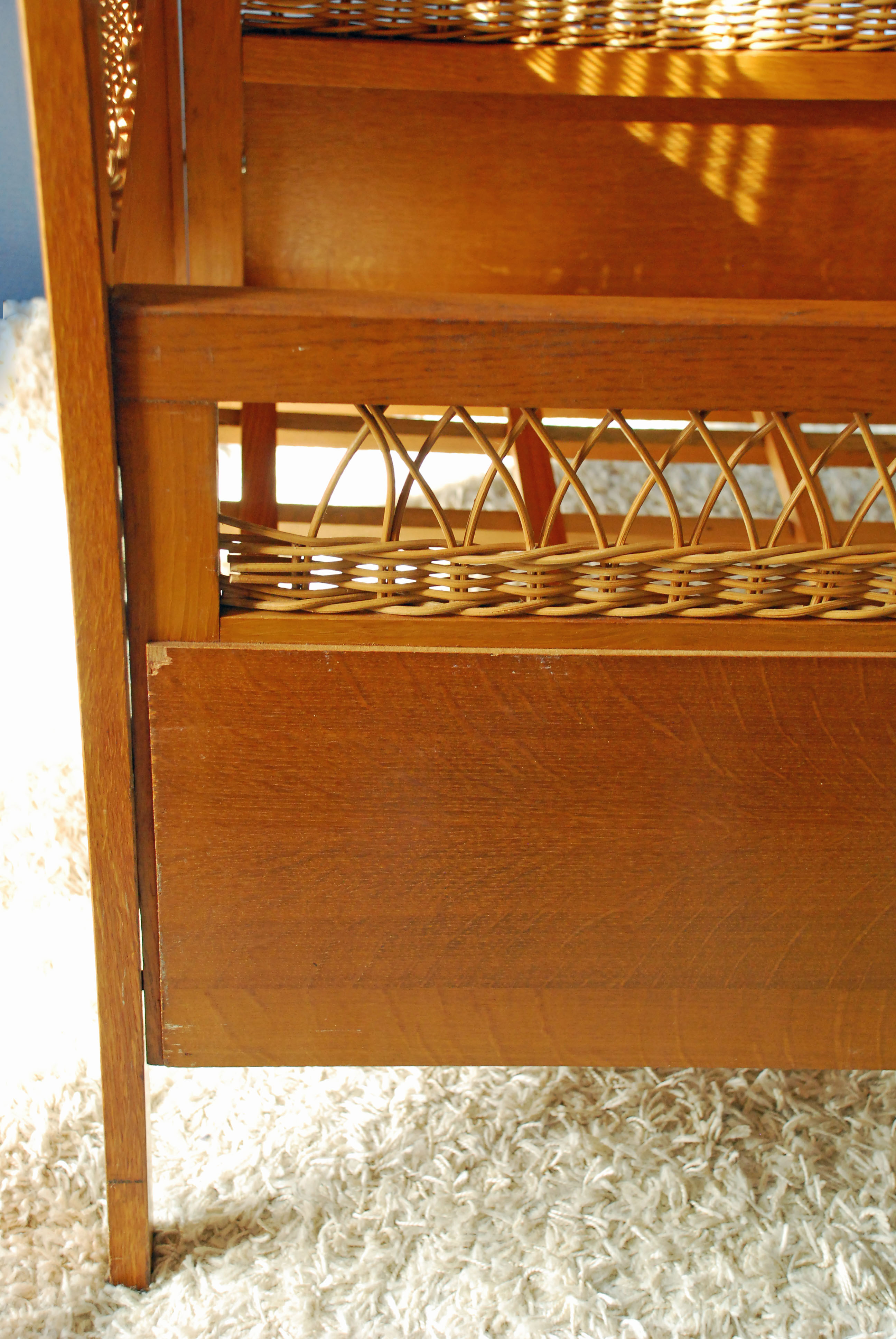 Wooden bed and vintage rattan