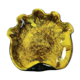 Empty pocket or ceramic ashtray in the shape of a shell
