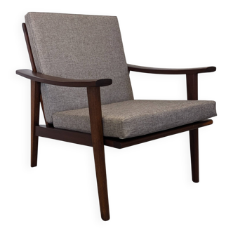 Scandinavian style armchair in teak, Eastern Europe around 1950.