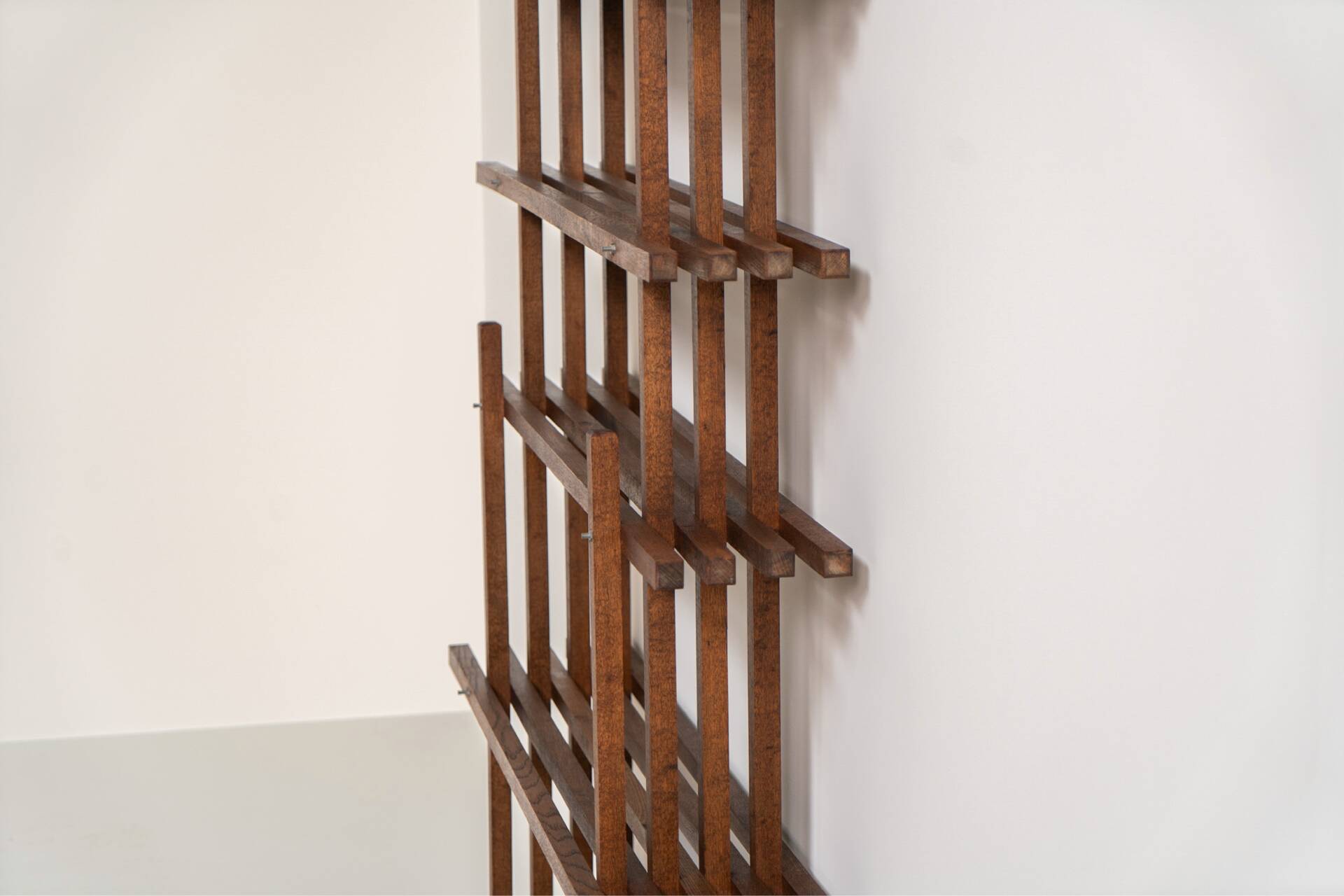 Sculptural wengé slat bookcase (Europe, 1960s).