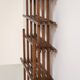 Sculptural wengé slat bookcase (Europe, 1960s).
