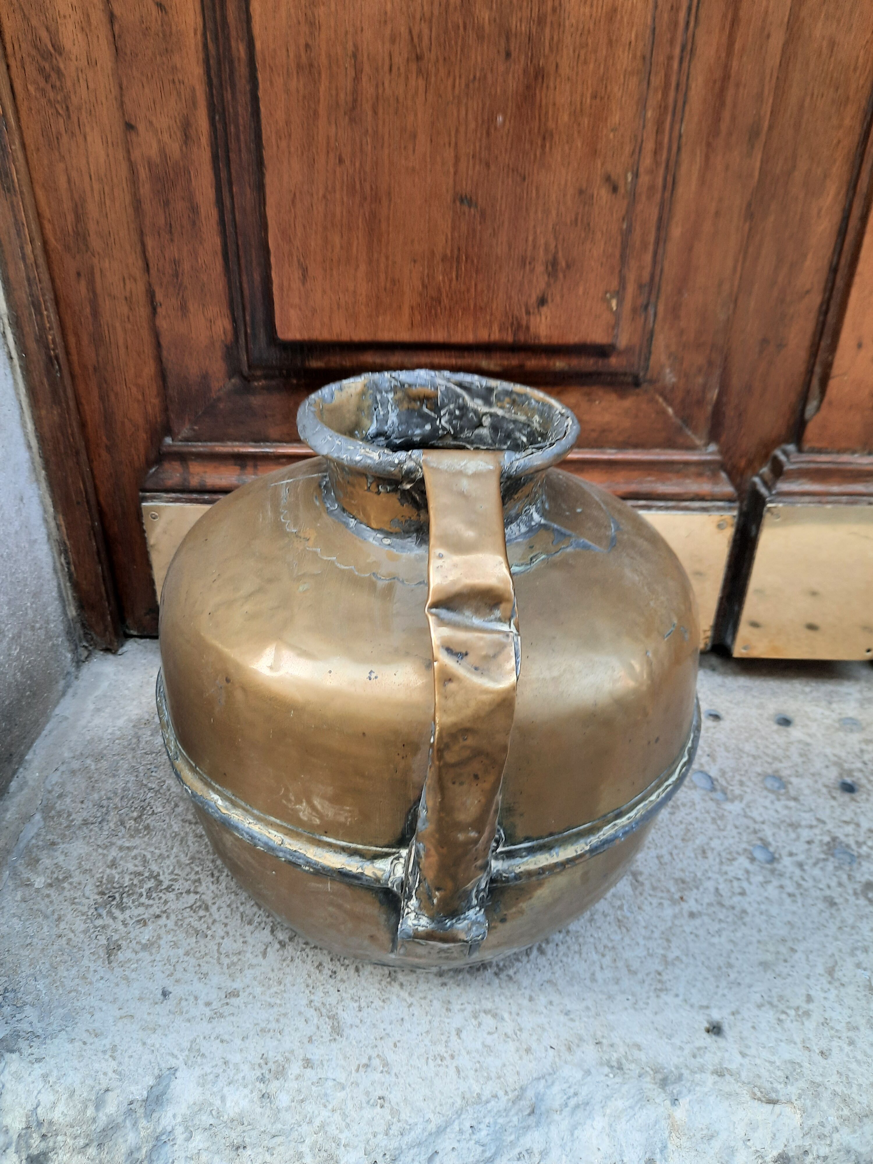 Antique brass jar