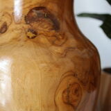 Artisanal vase in wood turned from varnished olive tree
