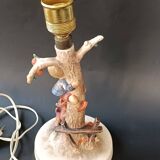 Goebel design Hummel ceramic lamp base with child on an apple tree, 1960s