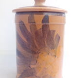 Terracotta ceramic pot with blue flowers