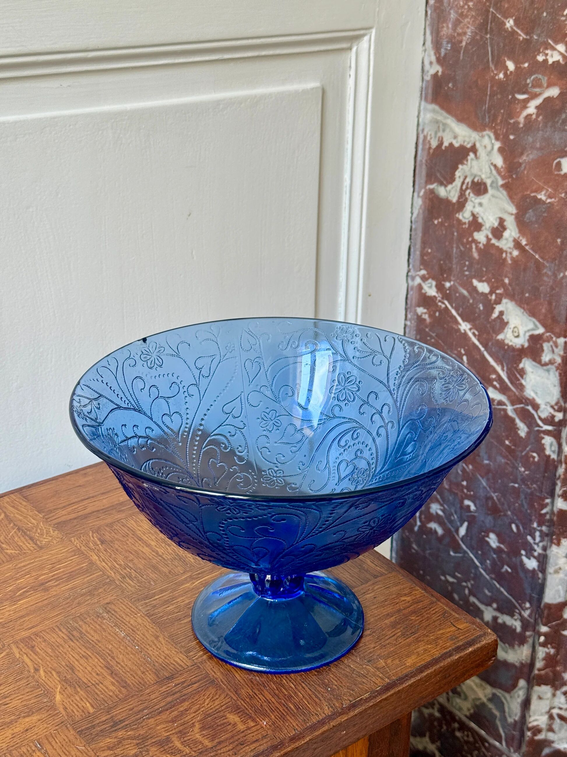 Bluish glass fruit bowl
