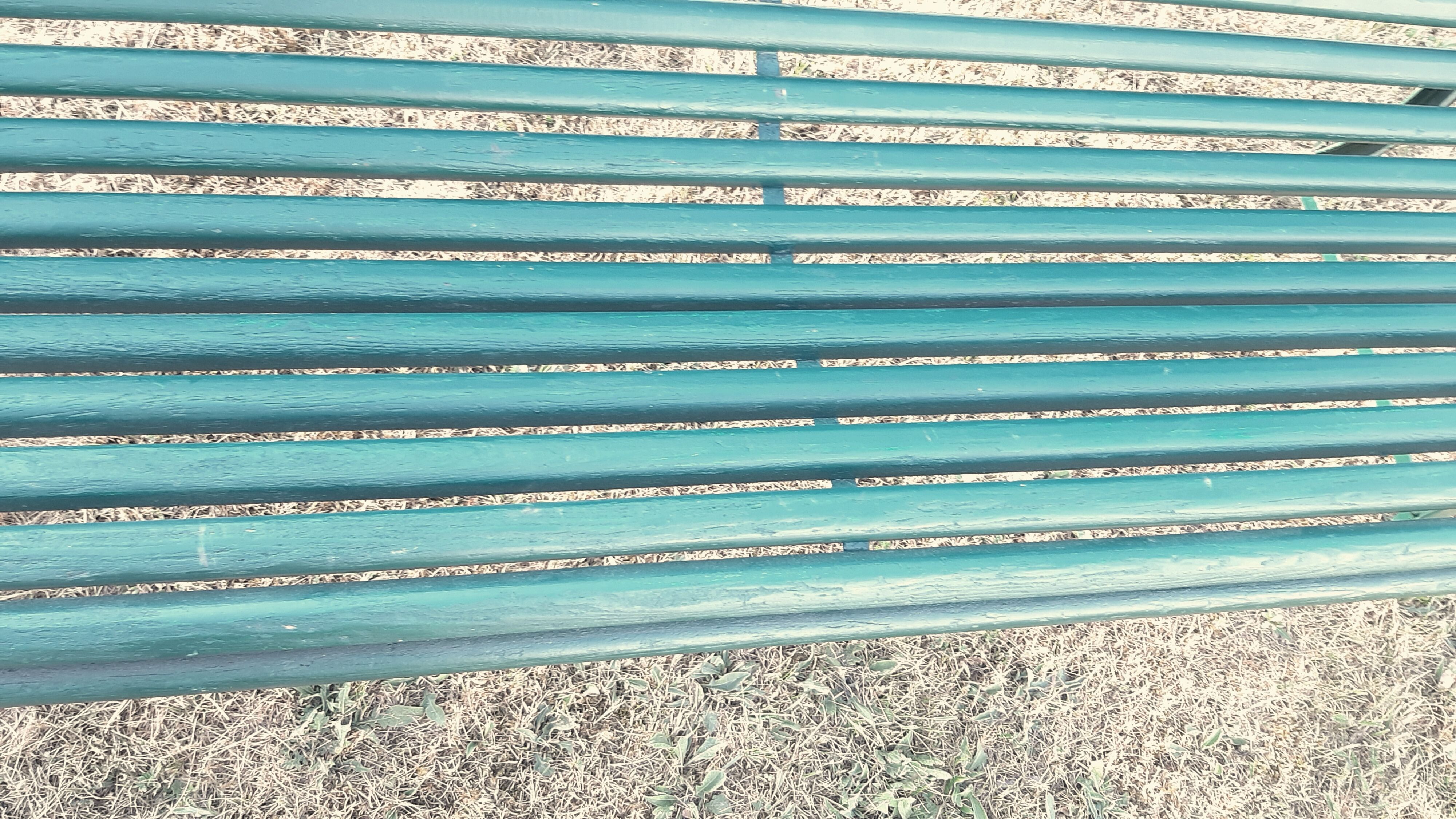 Garden bench with wooden and iron slats