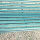 Garden bench with wooden and iron slats