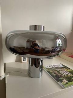 The "Bubble" table lamp in chrome finish, resulting from the collaboration.