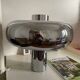 The "Bubble" table lamp in chrome finish, resulting from the collaboration.