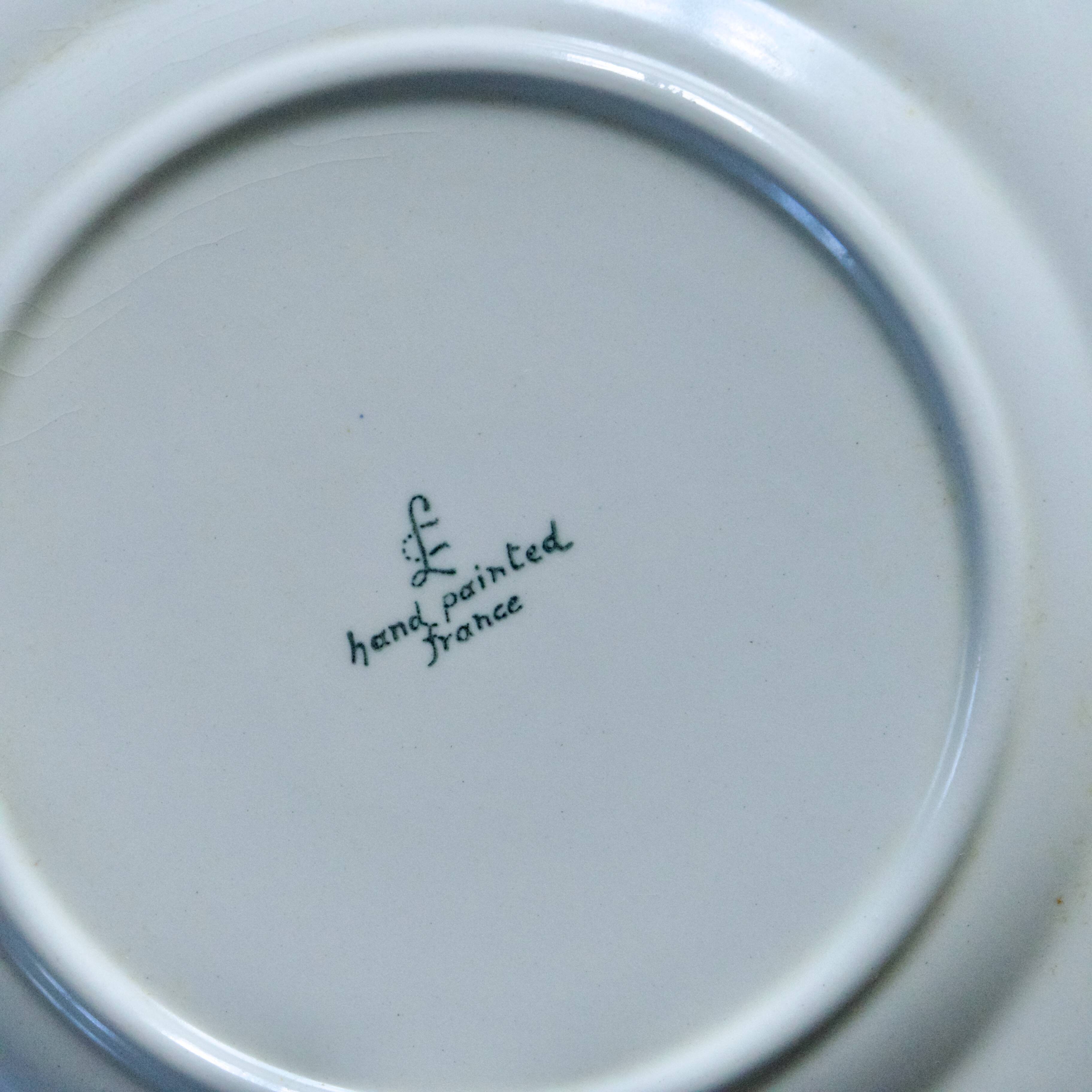 9 dessert plates from the Longchamp "Nemours" collection, hand-painted.