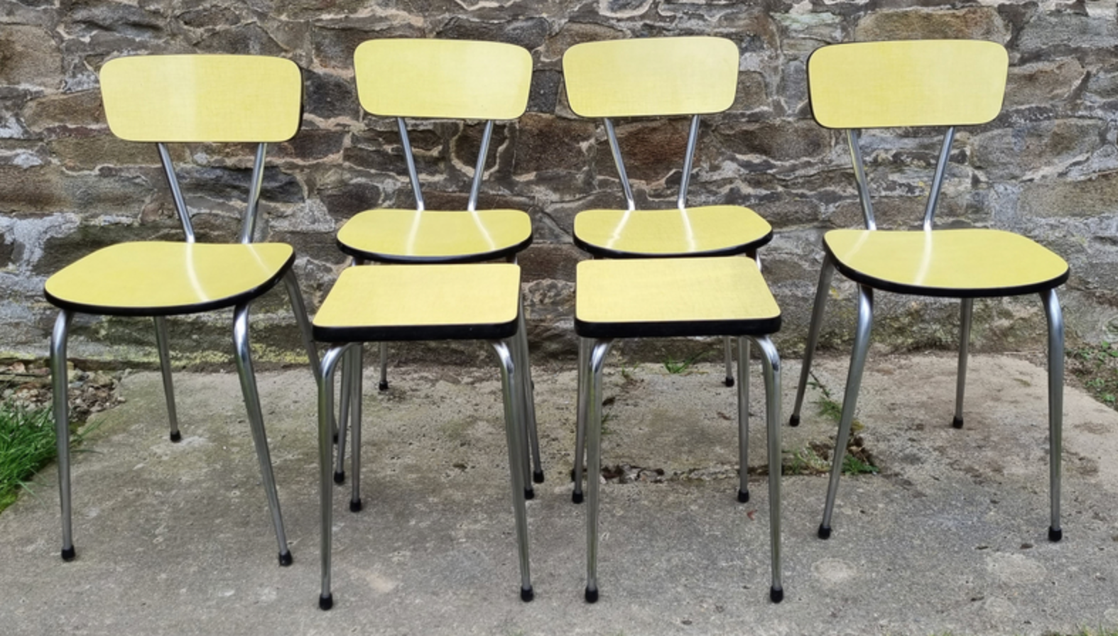 Yellow formica table, 4 formica chairs and 2 matching stools, vintage, 60s.