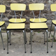 Yellow formica table, 4 formica chairs and 2 matching stools, vintage, 60s.