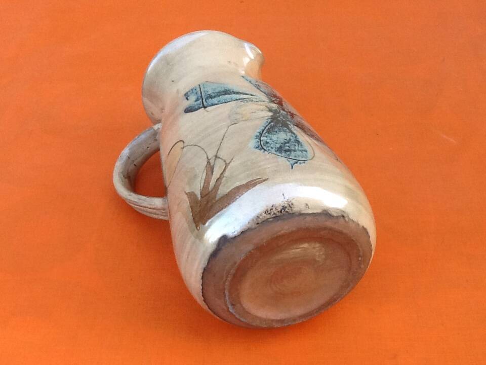 1960s Glazed terracotta pitcher with floral decoration