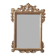 Mirror with a carved wooden frame in an antique style in pure gold.